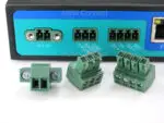 Close up image of the R2010 routers' power supply and serial and digital input and output connections and connectors